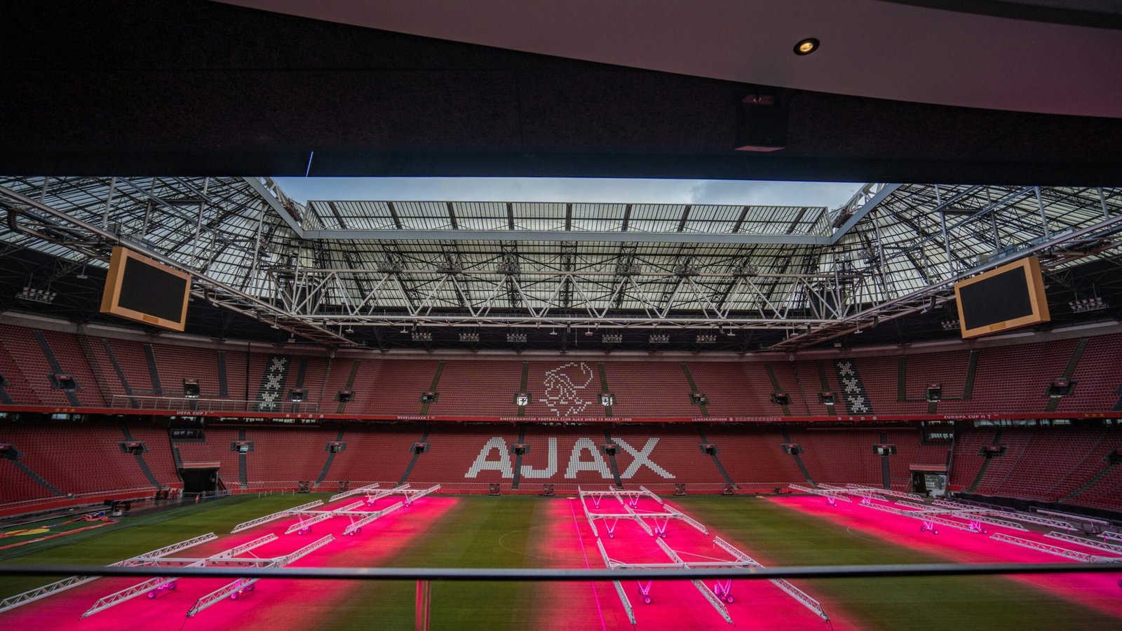 the inside of a stadium with the ajax logo on it